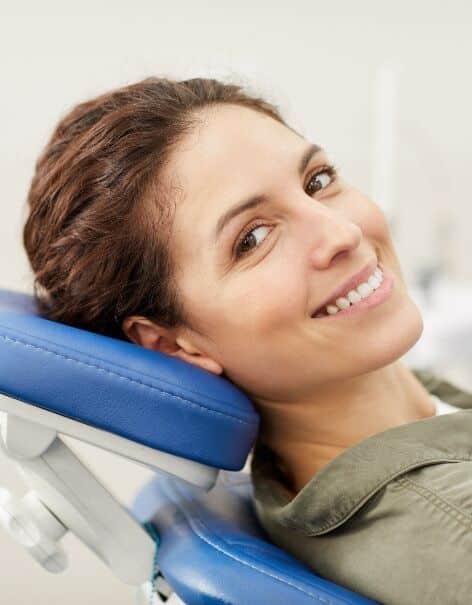 client smiling after procedure